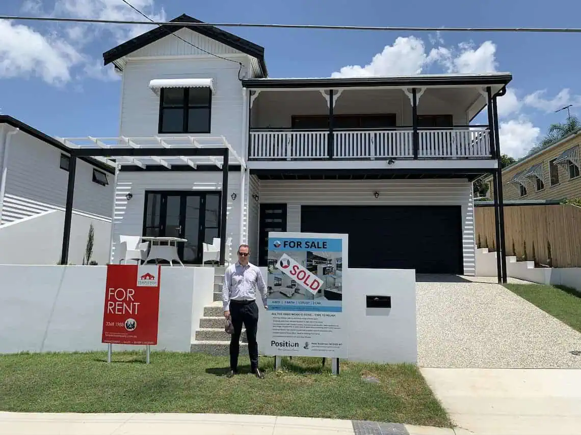 Buyer's Agent Sam Price from Templeton Property standing in front of a house he assisted in purchasing for a client