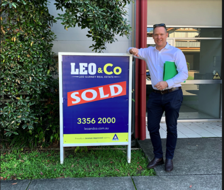 Sold sign and Sam Price Brisbane Buyers Agent